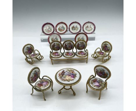 Lot includes - Victorian miniature furniture created with gilt metal frame and decorated porcelain on sofa, 2 rocking chairs 