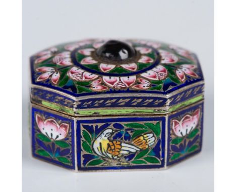 A small, but stunning polychrome enamel on a silver-plated box. The gilt interior decorated with floral engravings. A dark gr
