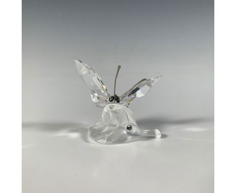 A lovely, clear and frosted butterfly figure perched on a leaf, adorned with metal antennae. Part of the In The Secret Garden