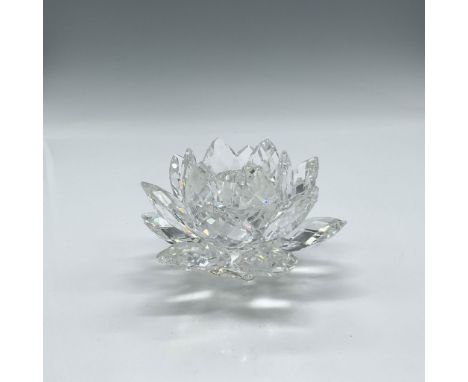 Lovely crystal faceted petals around center holder. Swarovski backstamp. 7600 123 000. This item has its original box: 5"H x 