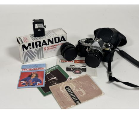 A Pentax ME Super camera with a fitted case and instruction book, with an Olympus A11 Flash light, a Miranda Multi-Dedicated 