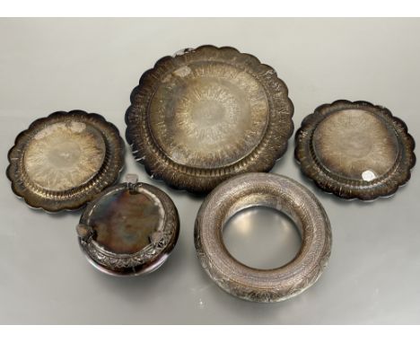 A collection of Malaysian white metal to include a pair of scalloped dishes with engraved fronds and lotus leaf borders D x 1