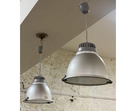 A set of three Italian Industrial style pendent light fittings by Castaldi, with brushed aluminium cases. D324cm.&nbsp;