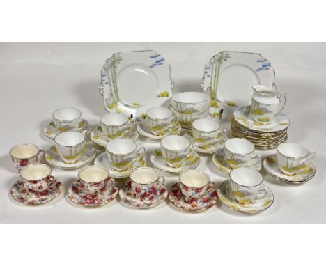 A Gladstone bone china "Springtime" with gilt rim pattern part tea service comprising, two serving dishes (w-24cm), ten teacu