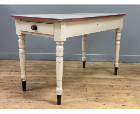 A Victorian cream painted pine side table, the later formica top above drawer to each end, raised on ring turned supports. H7