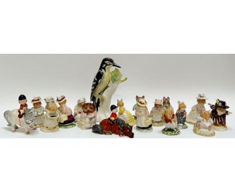 A large quantity of collectible figurines including several Royal Doulton/Beatrix Potter examples, two Beswick horse figures,