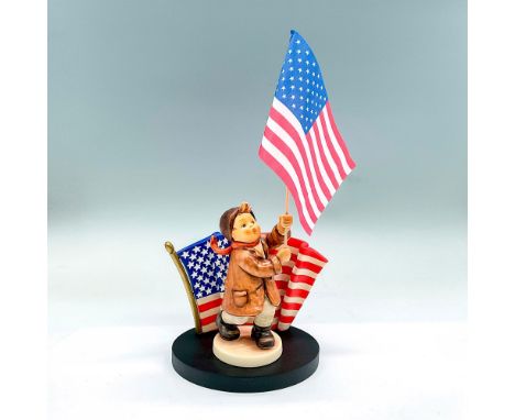 Includes a flag bearing boy on a base with flag backdrop. Boy is Call to Glory, Goebel Germany backstamp. Impress mark 739. T