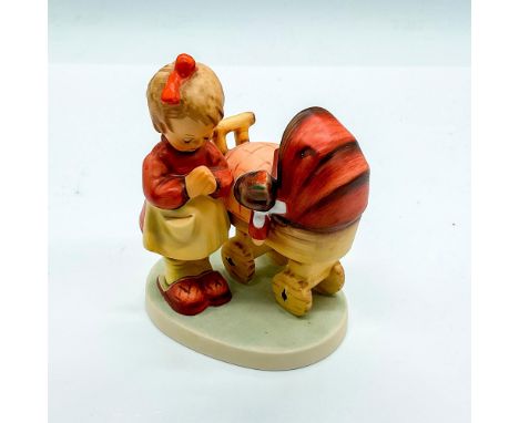 Hand painted girl in praying position with carriage. Goebel Germany backstamp. Impress mark 57. Issued: 2003Dimensions: 3.5"L