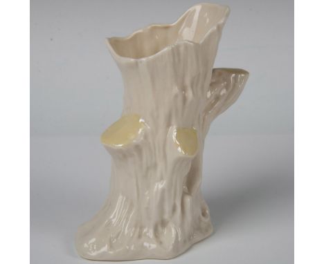 Enchanting Irish porcelain tree trunk vase in the Limpet Yellow pattern. Ivory colored with a yellow highlights and a lustre 