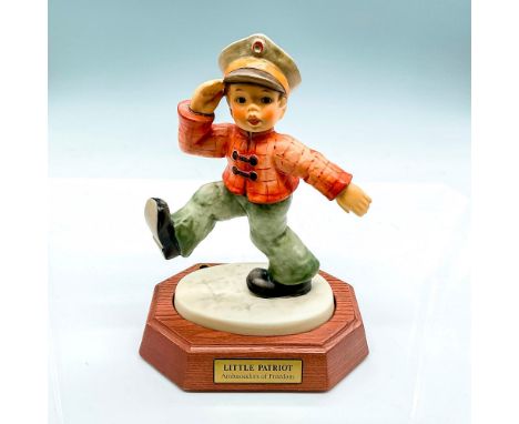 Limited edition 1425 of 3000 Ambassadors of Freedom. Hand painted young boy in red jacket and gray cap. This item has a wood 