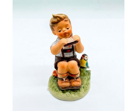 Hand painted boy with a harmonica and bird. Goebel Germany backstamp. Issued: 1998Dimensions: 2.5"L x 2"W x 4.5"HManufacturer