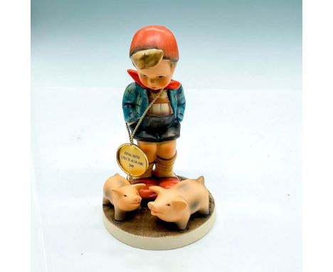 Final Issue, hand painted boy with red cap and 2 pigs. Goebel Germany backstamp. Impress mark 66. Issued: 2005Dimensions: 5.5