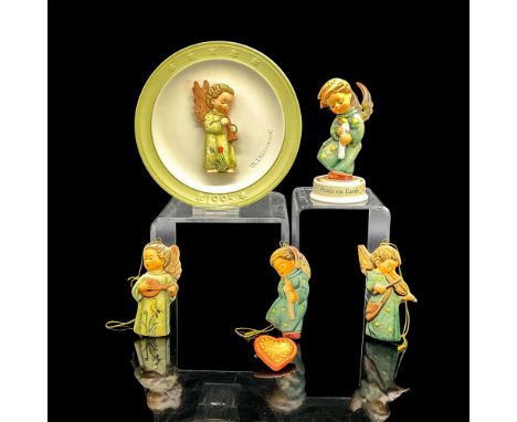 Decorative porcelain pieces featuring pleasant images of angel children. Three ornaments 3"L x 1.5"W. Heavenly Angel figurine