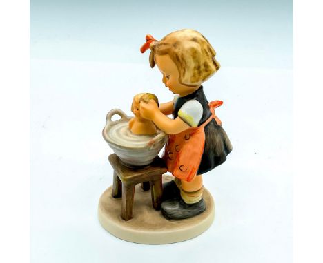 Hand painted girl giving a doll a bath. Goebel Germany backstamp. Impress mark 319. Issued: 2002Dimensions: 3.25"L x 2.5"W x 