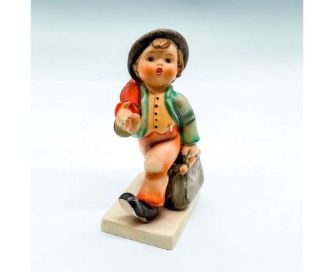 Hand painted boy with red umbrella. Hummel backstamp. Issued: 20th centuryDimensions: 2.75"L x 1.75"W x 4.5"HManufacturer: Go