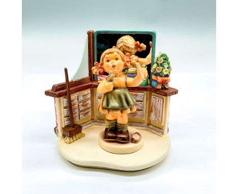 Includes hand painted girl with a comb and scissors on Day of Beauty base. Girl is First Edition 2001, Goebel Germany backsta