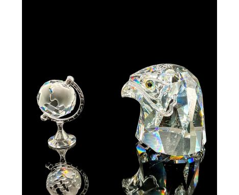 Clear crystal bust of a falcon head with blue/yellow/green glass eyes, 1.75"L x 1.5"W x 1.75"H. Clear and satin crystal globe