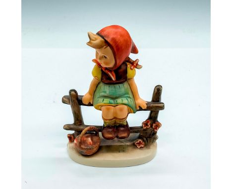 Hand painted girl sitting on a fence. Goebel Germany backstamp. Impress mark 112. Issued: 1993Dimensions: 3.5"L x 2" W x 5"HM