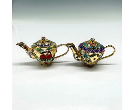 Lovely, raised enamel over gold toned metal ornaments with floral designs colored in red, green, blue. Issued: 20th centuryDi