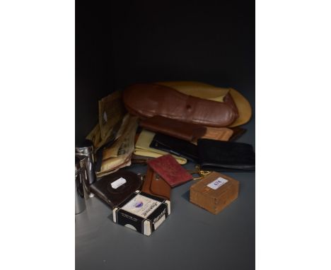 An assortment of gents vintage items including slippers, collar studs, collars, coin cases and more.