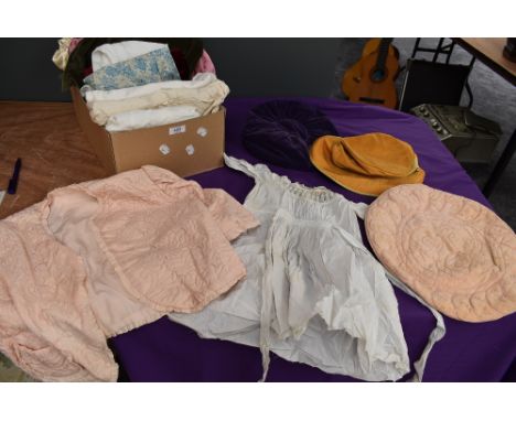 A mixed collection of vintage and antique items including childrens gowns,bed jackets, hats and more.
