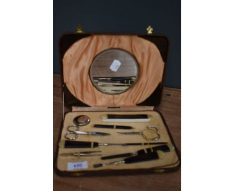 A vintage manicure set in original box with swig tags still attached.
