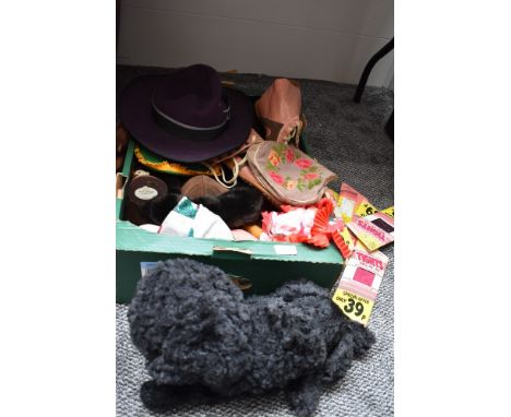 A box of mixed vintage and retro items and accessories including poodle pyjama cases, needlepoint bag, tights, hats and simil