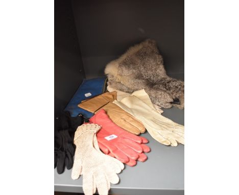 An assortment of vintage leather gloves, fur gauntlets and similar including case,various sizes and styles.