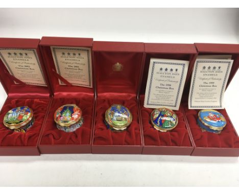 A collection of five ‘Halcyon Days’ enamel Christmas boxes (dated 2003, 2001, 2000, 1998 & 1999).