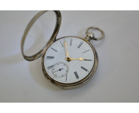 A silver cased open faced, key wind pocket watch. Maker Wakefield Gateshead. With a white enamel dial and second subsidiary d