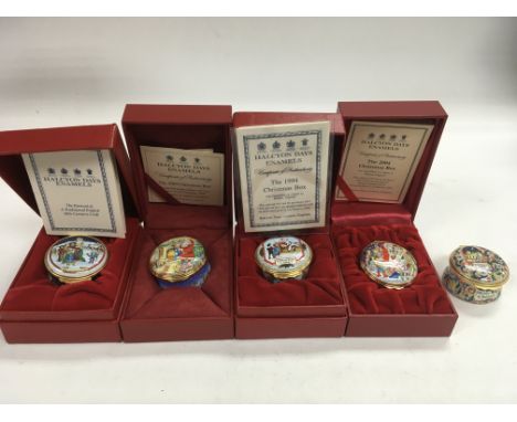 A collection of five ‘Halcyon Days’ enamel Christmas boxes (dated 1993, 2009, 1994, 2004 & 1992).