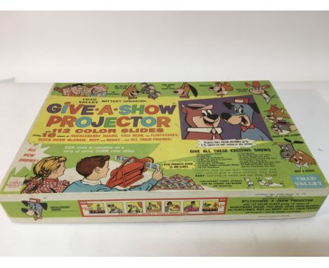 A boxed Chad Valley 'Give a show' projector.