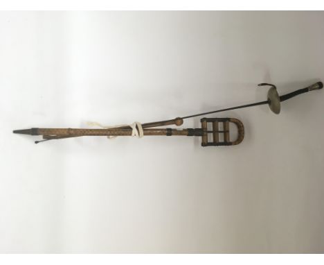 A military officer’s swagger stick, a fencing sword and shooting stick