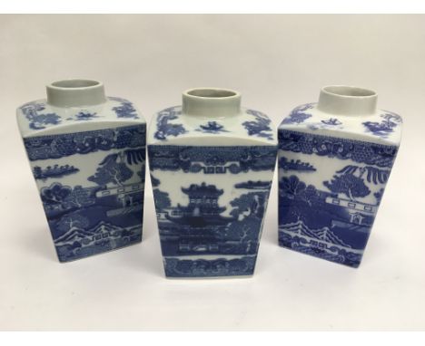 Three blue and white ceramic tea caddies in the Oriental style.