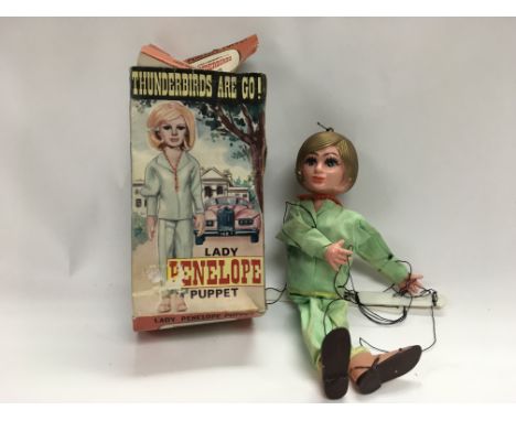 A boxed Thunderbirds Lady Penelope puppet.