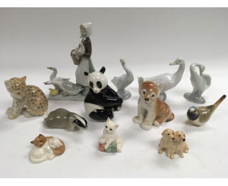 A collection of ceramic figures including examples by Royal Doulton, Beswick and Lladro.