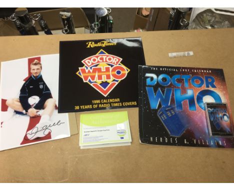 A 1996 Radio Times ‘Doctor Who’ calendar signed by Peter Davison, a similar caledar from 1997 with the bonus tape and a signe