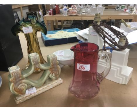 An Art Deco white glazed table lamp, Beswick candlestick, cranberry jug, art glass vase and a ceramic chicken mould