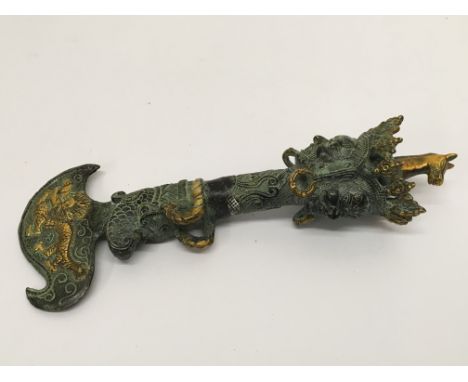 A bronzed and gilt metal decorative item depicting deities and dragons, approx 20cm.