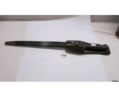 A WWI Remington bayonet in scabbard.