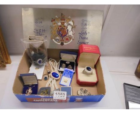 An interesting simulated collection of Princess Diana's jewellery - rings, necklace, various other items including the blue s