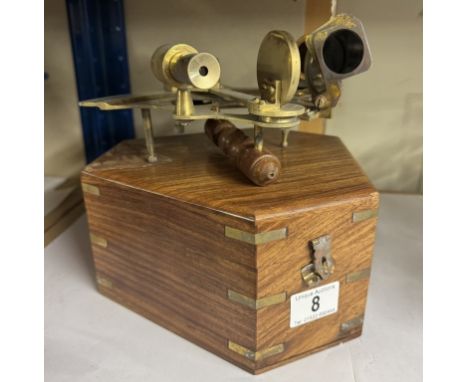 A brass sextant in teak box 