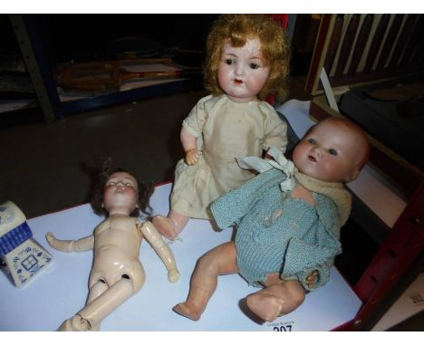 Two Armand Marseille porcelain headed dolls and one other.