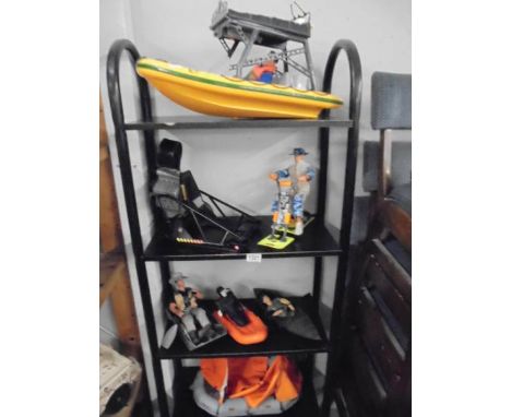 A quantity of Action Man etc., water craft accessories including rib boat, canoe etc., (4 shelves)