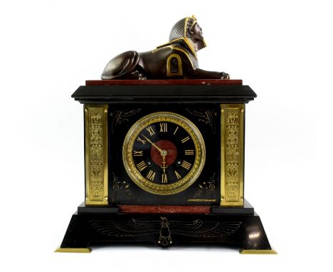 Late 19th century French black marble mantel clock in the Egyptian revival style, the two train movement striking on a gong 3
