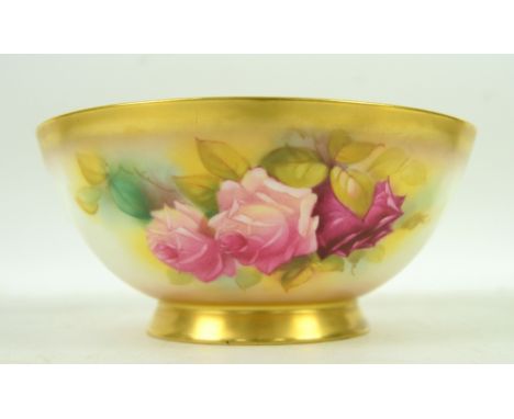 Royal Worcester bowl painted with roses, signed M Hunt, factory marks for 1932 to base, diameter 22 cm .     Overall conditio