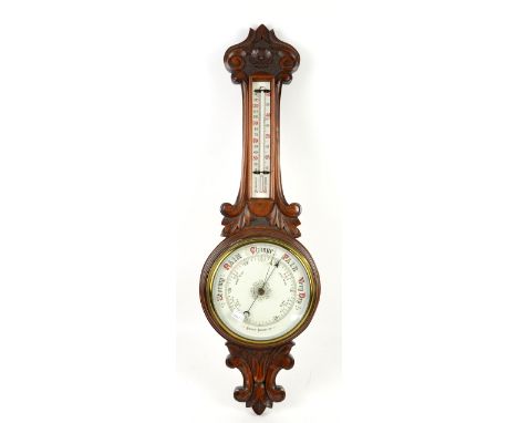 Early 20th century walnut banjo form barometer 83cm  .     Thermometer and barometer dials crazed.Light wear and tear.     Pl