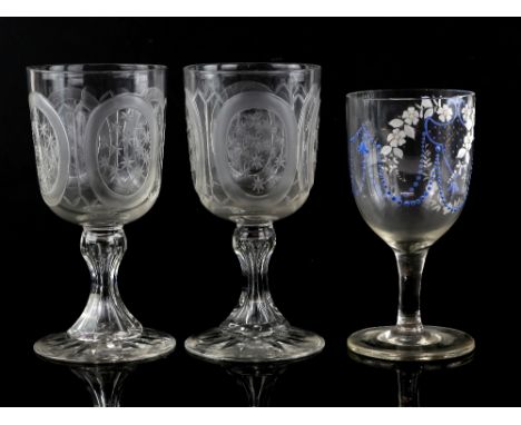A pair of late 19th century Gothic style etched goblets with engraved arch and star decoration on a faceted stem, 18cm, and a
