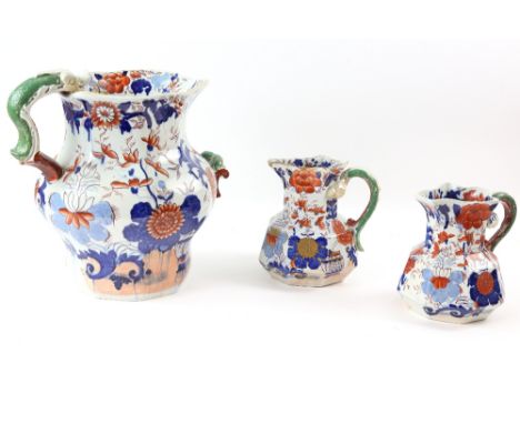 19th Century Masons Ironstone Imari pattern, two octagonal jugs with serpent handle, 18cm, and a very large pitcher similar, 