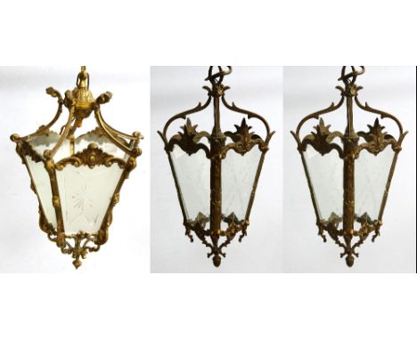 Pair of gilt metal square tapering hanging lanterns, the glass with cut floral decoration and a similar pentagonal lantern, (